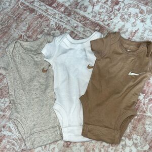 Nike onesies like new!